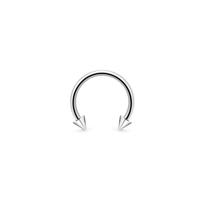 Stainless steel spike horseshoe septum ring on white background